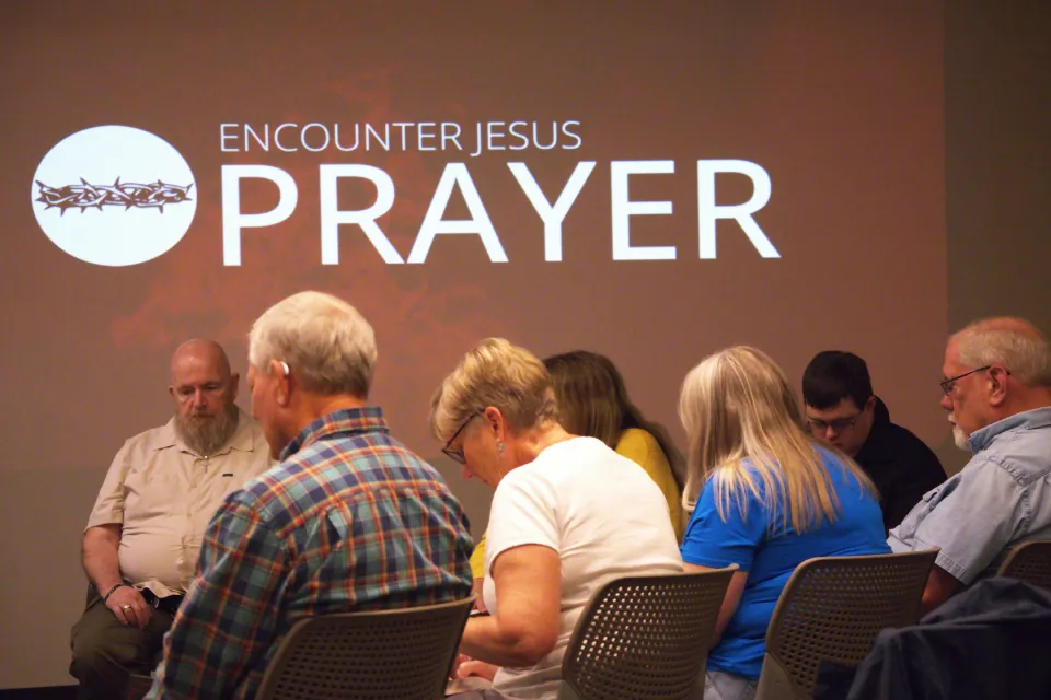 A picture of a group of people from our Pre-Service Prayer.